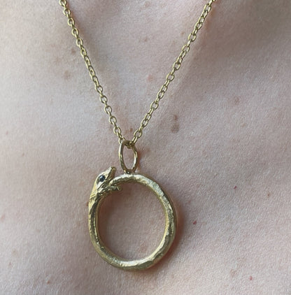 Ciondolo uroboro bronzo e zaffiro